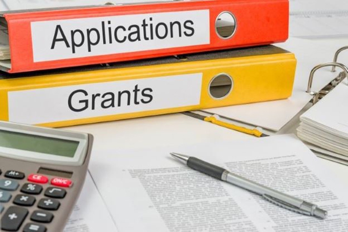 Are you writing a grant application or announcing the Second Coming?