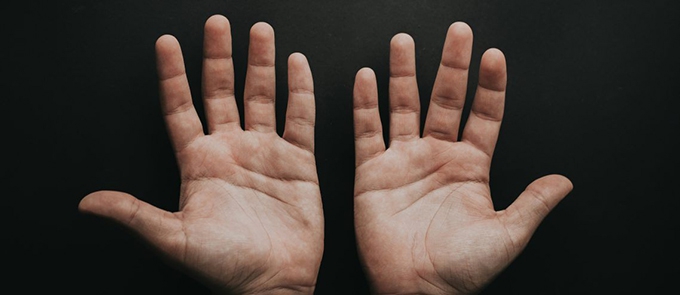 Why do we have one hand less skilled than another?