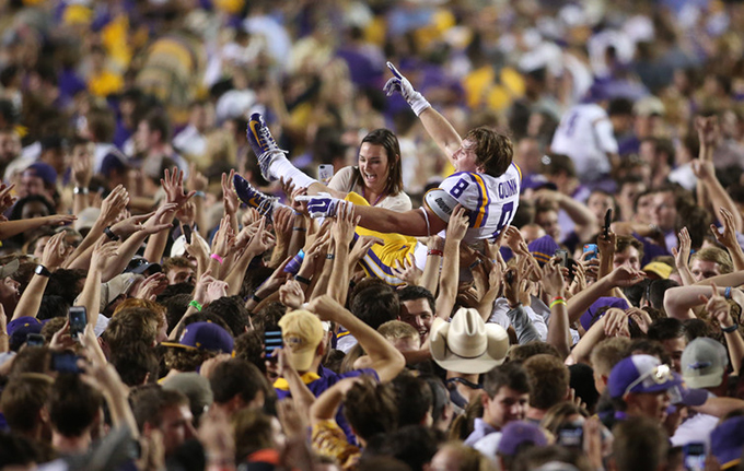 LSU Tigers wide receiver Trey Quinn is hoisted up by fans, Oct. 25, 2014. Crystal LoGiudice/USA TODAY Sports via REUTERS